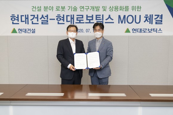 현대로보틱스와 현대건설(000720)이 '건설 로보틱스 기술 공동 연구개발'에 대한 MOU를 체결했다. ⓒ 현대중공업