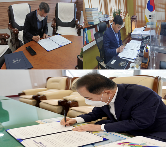 김지철 충남교육감(아래)과 황명선 논산시장(오른쪽), 이진구 논산교육장이 논산행복교육지구 2기 업무협약을 비대면으로 체결하고 있다. ⓒ 충남교육청