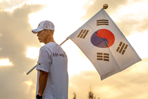 GS칼텍스가 광복절을 맞아 독립유공자 후손을 지원하는 '815 런'을 후원한다. 사진은 가수 션. ⓒ GS칼텍스