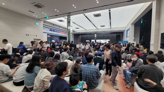 지난 20일 진행된 한강 수자인 오브센트 예비입주자 추첨 및 계약 현장 모습. Ⓒ 한양