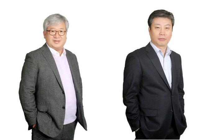 리딩투자증권 사내이사로 연임하는 김충호 총괄부회장(왼쪽)과 최규원 대표이사. ⓒ 리딩투자증권